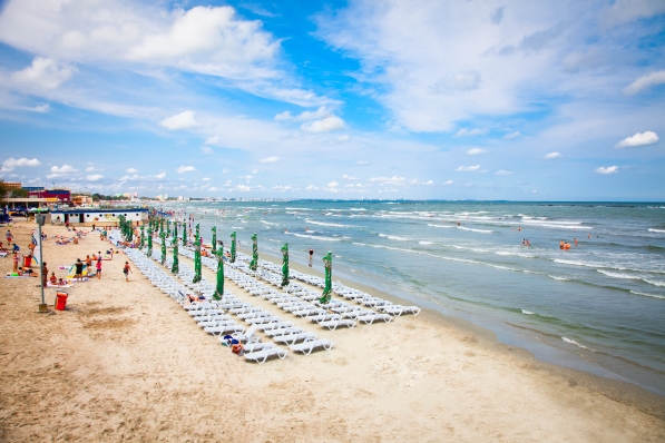 Beautiful beach in summer on August 11, 2012 in Mamaia, Romania shutterstock_126331538