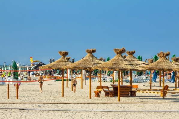 Black Sea coast beach on a sunny day on August 05, 2011 in Mamaia, Romania shutterstock_136267046